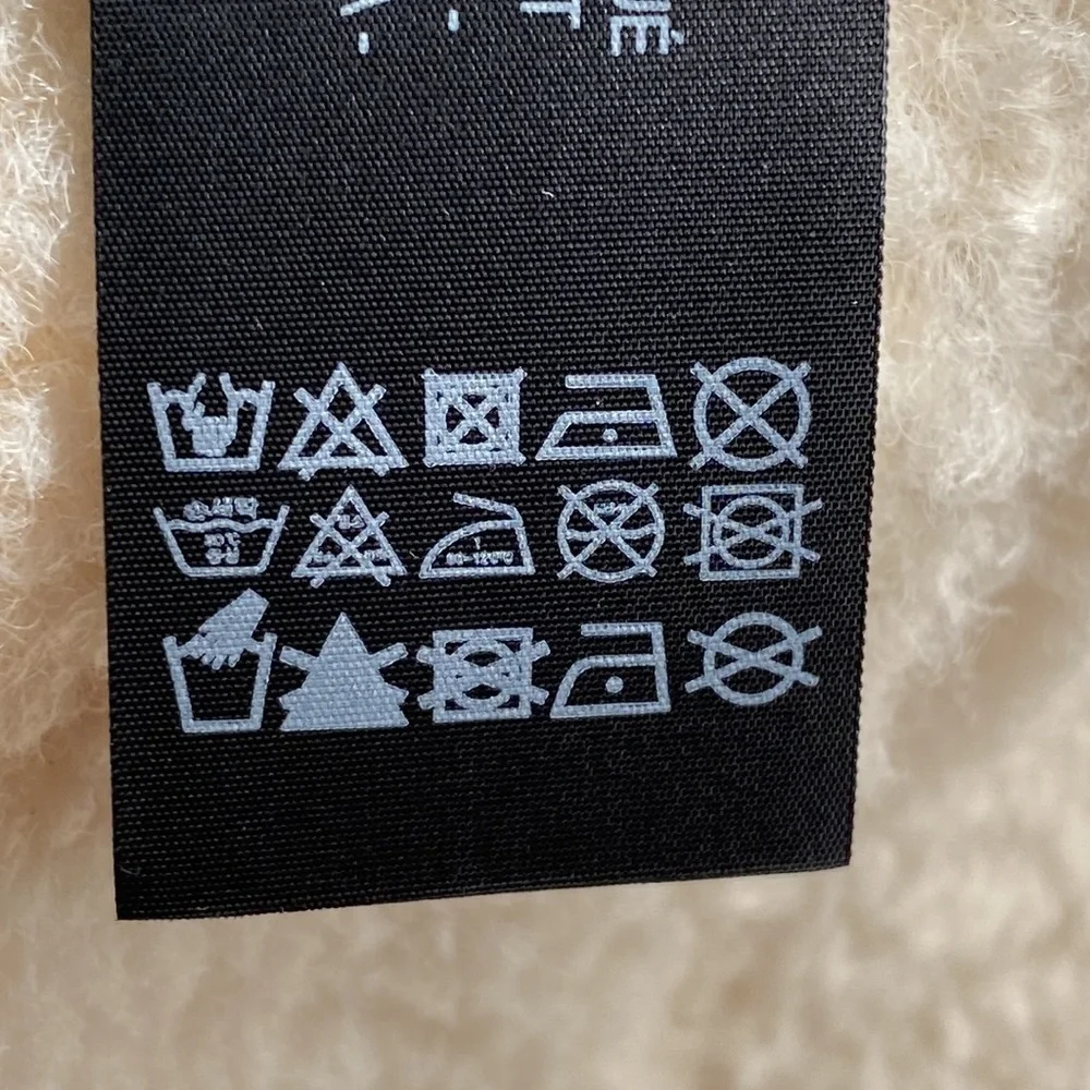NWOT. Zara Cream Fleece Cap. Size S-M.